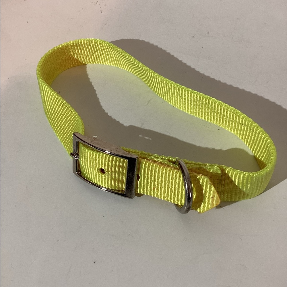 Dog collar, bright yellow, 24” x 1”, heavy nylon, metal hardware. Adjustable